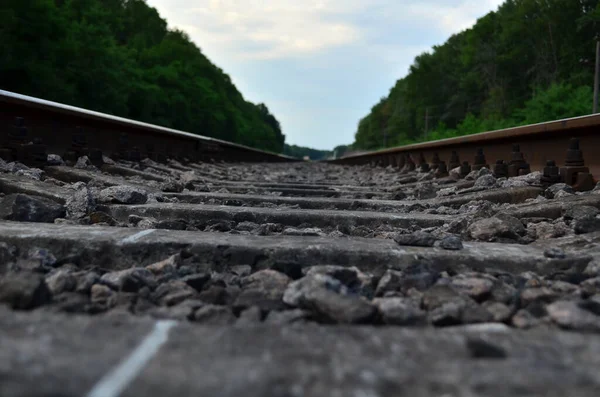 Railway track with a background of clouds — Stock Photo, Image