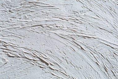 Boyalı duvar ince doku closeup fotoğraf ile. Beyaz fırça dokulu sıva.