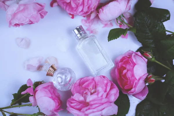 Two Small Bottles Perfumes Pink Flowers — Stock Photo, Image