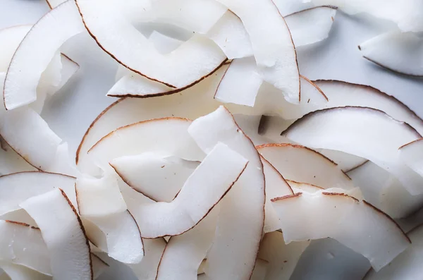 ロースト焼きトースト自然な薄いスライス ココナッツ チップ バック グラウンド テクスチャ — ストック写真
