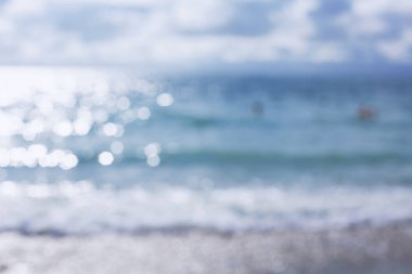 Tropikal plaj ile bokeh güneş ışık dalga arka plan bulanıklık