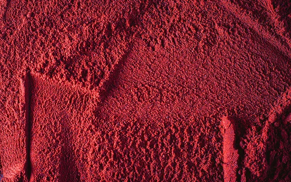 red powder beauty makeup compound texture pattern for background.
