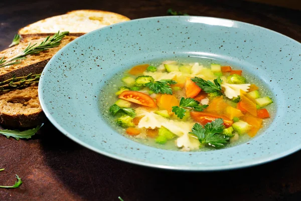 Fresh vegetable soup made of green bean, pea, carrot, potato, re — Stock Photo, Image