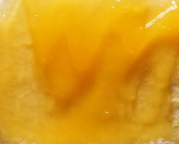 Текстура желтого варенья — стоковое фото