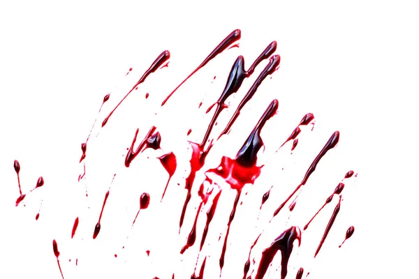 Sangre roja salpicada sobre un fondo blanco — Foto de Stock