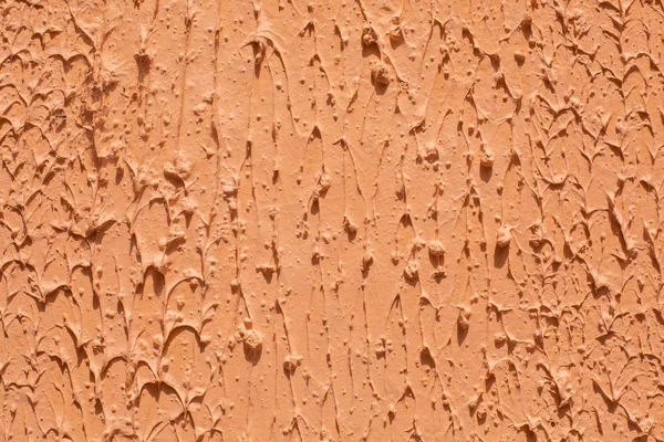 Abstract background of plastered wall in orange tones. — Stock Photo, Image