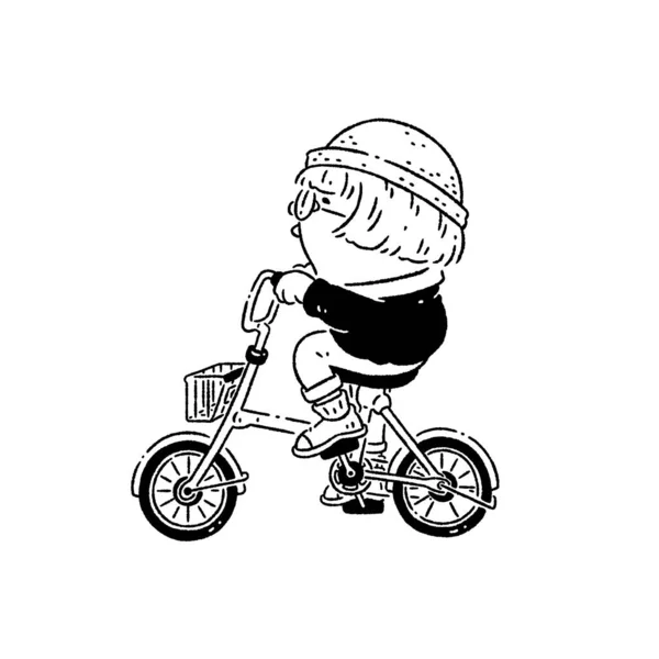 自転車に乗ってゆっくり歌う少年 ロイヤリティフリーのストック画像