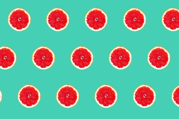 Pink grapefruit seamless pattern isolated on mint — Stock Photo, Image