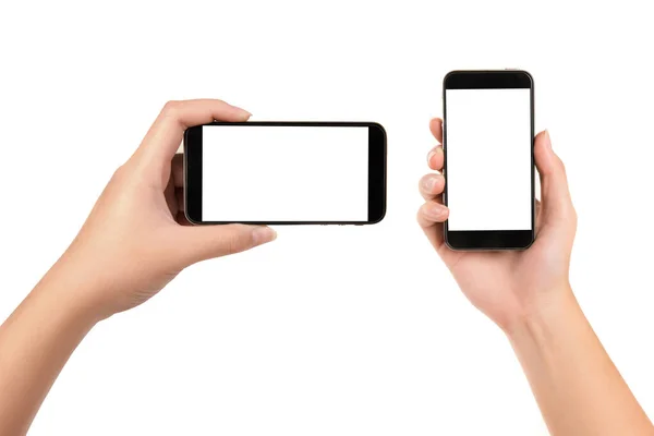 Beyaz arka planda izole edilmiş akıllı telefonu tutan genç bir kadın..