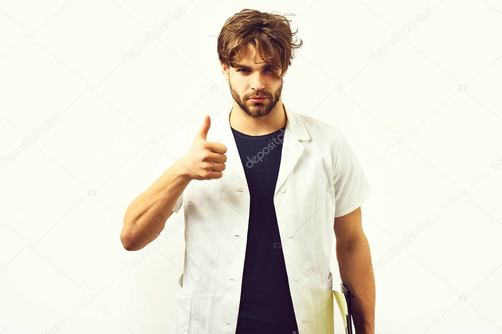 Bearded caucasian doctor or postgraduate student with clipboard