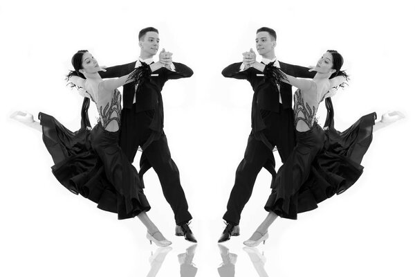 ballroom dance couple in a dance pose isolated on white