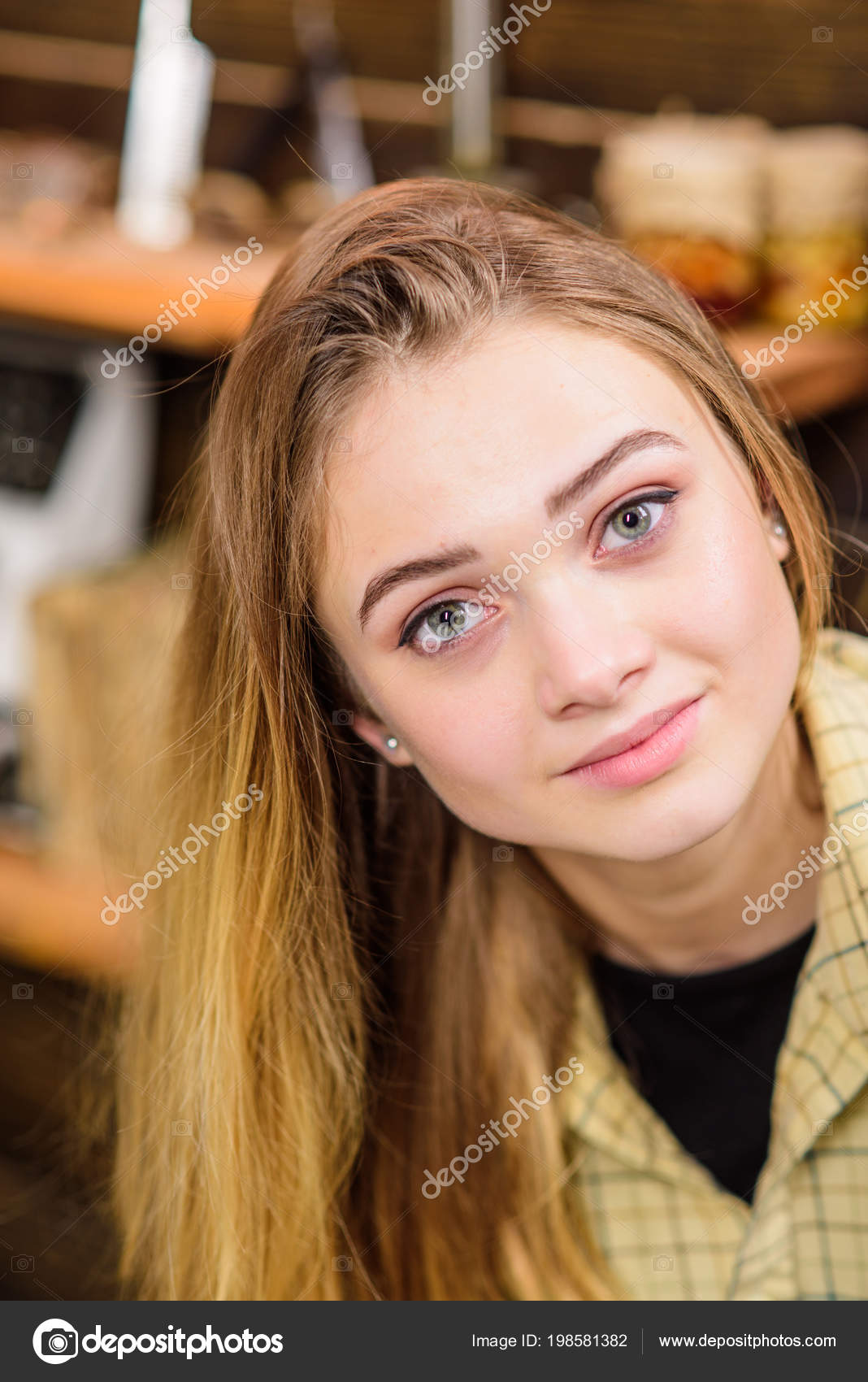 Teenage Girl With Beautiful Green Eyes And Full Lips Posing