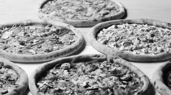 Different pizzas set for menu Fast food restaurant concept. Take away food with various ingredients
