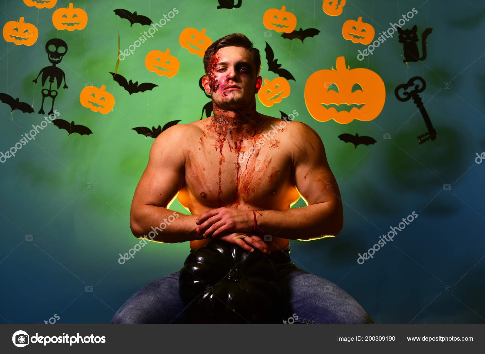 Trick or treat and sexy body concept. Macho with Halloween Stock Photo by  ©stetsik 200309190