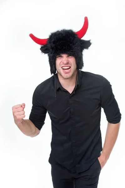 Man horns as devil or bull aggressive threaten violence gonna punch you. Aggressive intimidating individuals like to deliberately upset you. Aggression and provocative behaviour. I am gonna punch you