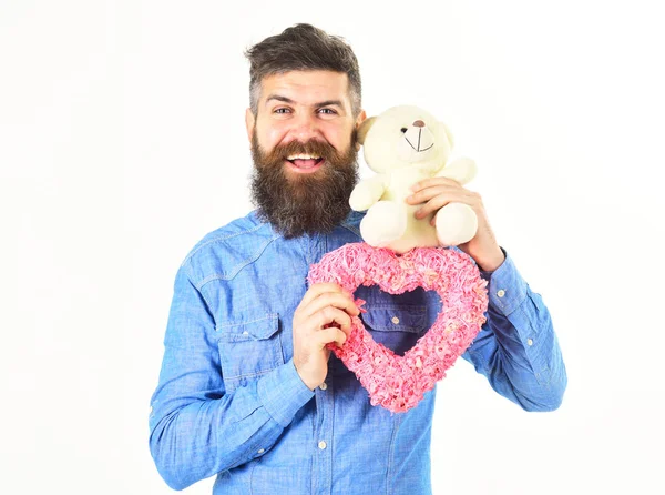 Bearded macho man with pink valentines heart — Stock Photo, Image