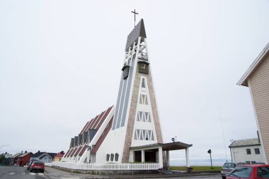 Hammerfest, Norway - January 21, 2010: church building on grey sky. Modern architecture and design. Religion and christianity clipart