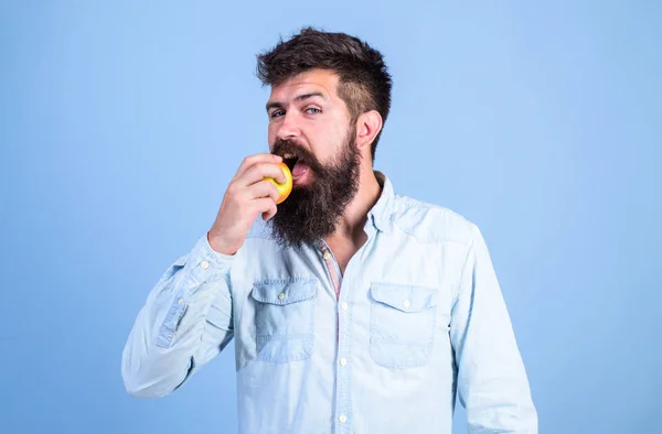 Eat apple can help lower blood sugar levels and protect against diabetes. Eat healthy. Man with beard hipster hold apple fruit hand. Nutrition facts and health benefits. Apples popular fruit in world