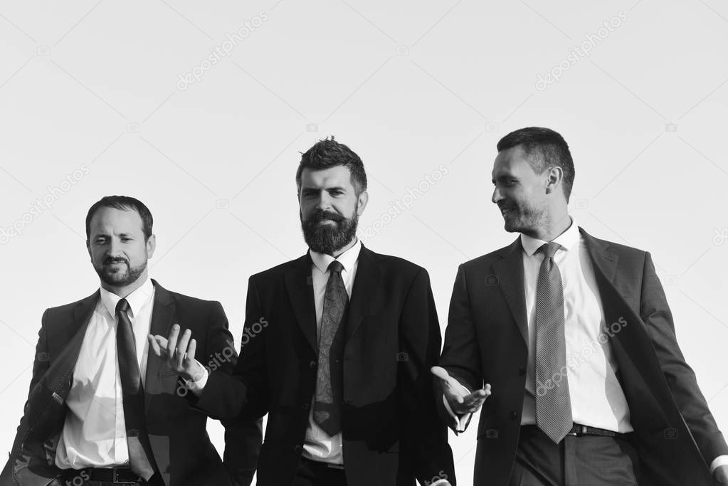 Managers go ahead and talk. Business and success concept. Board of businessmen wear suits