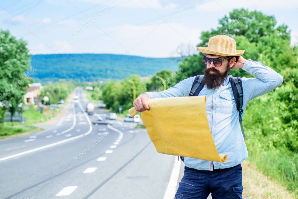 Allow recognize enough details to walk somewhere if get lost. I am lost on my way. Tourist backpacker map lost direction travelling. Around the world. Find direction map large sheet of paper