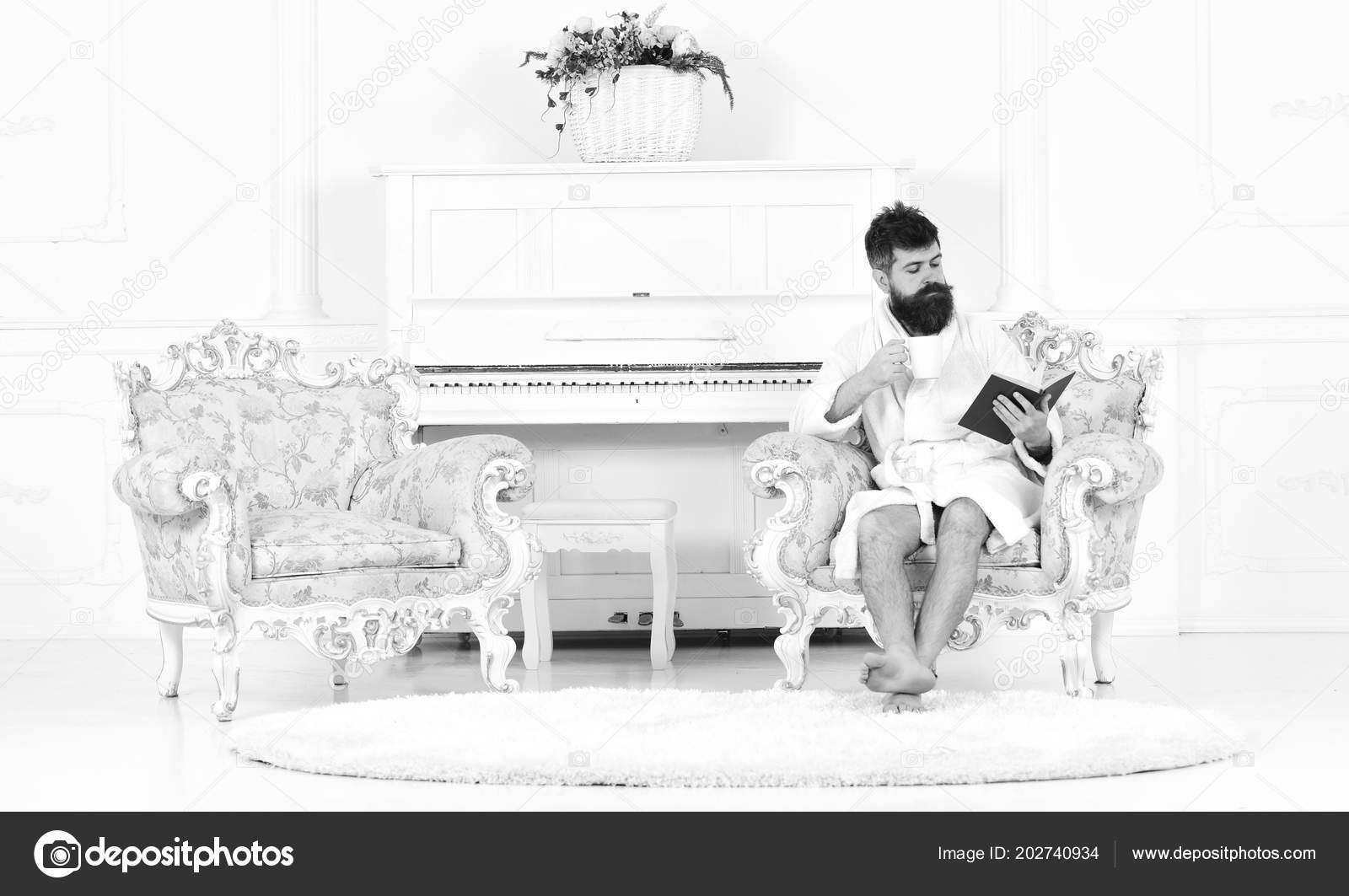 Morning Reading Interested Man Reading A Book Over A Cup Of