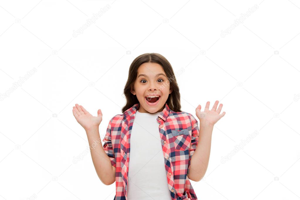 Girl with open mouth on surprised face isolated on white. Little child in casual style. Kid with long brunette hair and beauty look. Funky emotions. Surprise