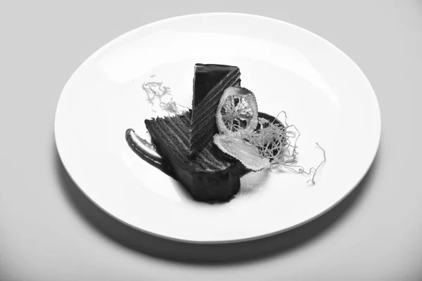 Confectionery and sweets concept. Piece of chocolate cake