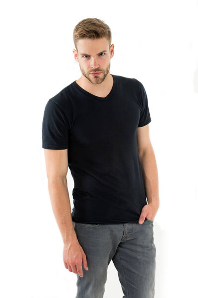 Confident in his style. Man with bristle confident strict face isolated white background. Man unshaven guy put hand pocket looks handsome confident. Guy wear casual black shirt. Simple but classic