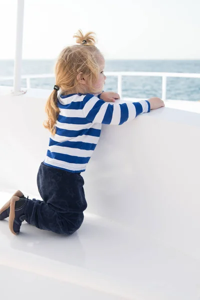 Child enjoy vacation on cruise ship. Vacation whole family enjoy. Family vacation cruise ship all inclusive tour. Kid boy toddler travelling sea cruise. Child in striped shirt looks like young sailor