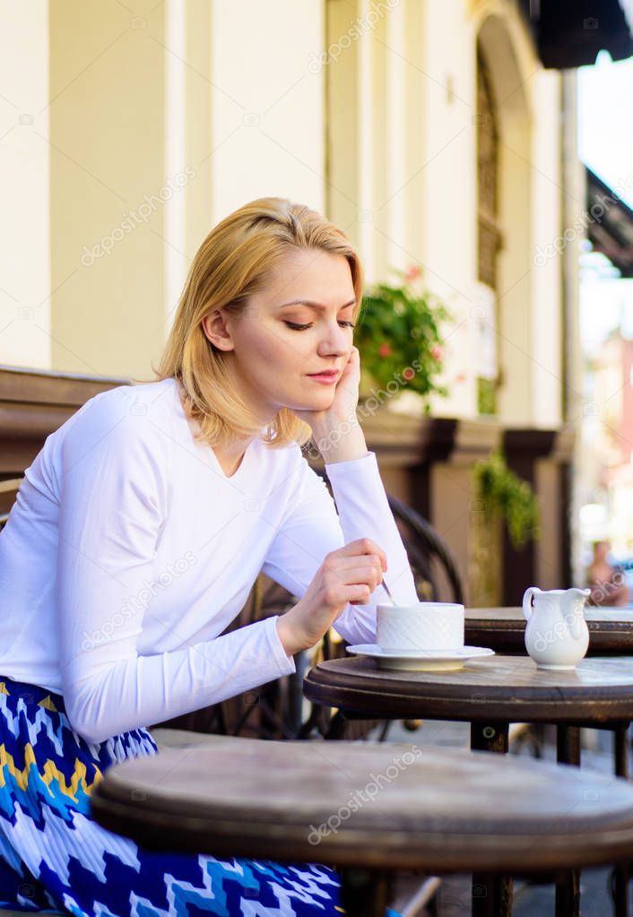 Woman lonely wait date. Dating advice for women. Still waiting him. How enjoy being single tips. Woman sits alone cafe terrace urban background defocused. Girl sit alone cafe waiting him