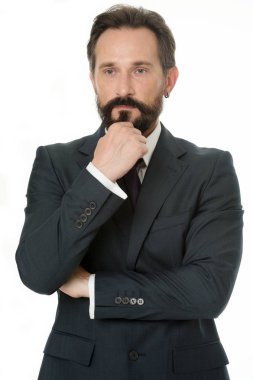Zor bir karar. İş adamı klasik resmi kıyafet karar verirken çeneye dokunur. İş davranışları kendinden emin olmalı. İş adamı başarısı tavsiyeleri. Başarılı olmak istiyorsan bunu bilmelisin.