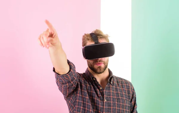 Vr technology gives new opportunities in engineering. Man unshaven guy virtual reality glasses, pink background. Hipster use modern technology virtual reality. Guy head mounted display work 3d space