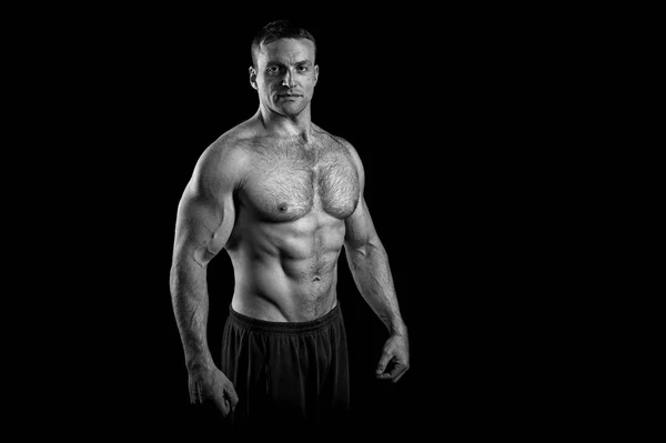 Strong concept. Strong man with sexy torso. Bodybuilder with strong body. Exercise to be strong and your life prolong, copy space, black and white — Stock Photo, Image