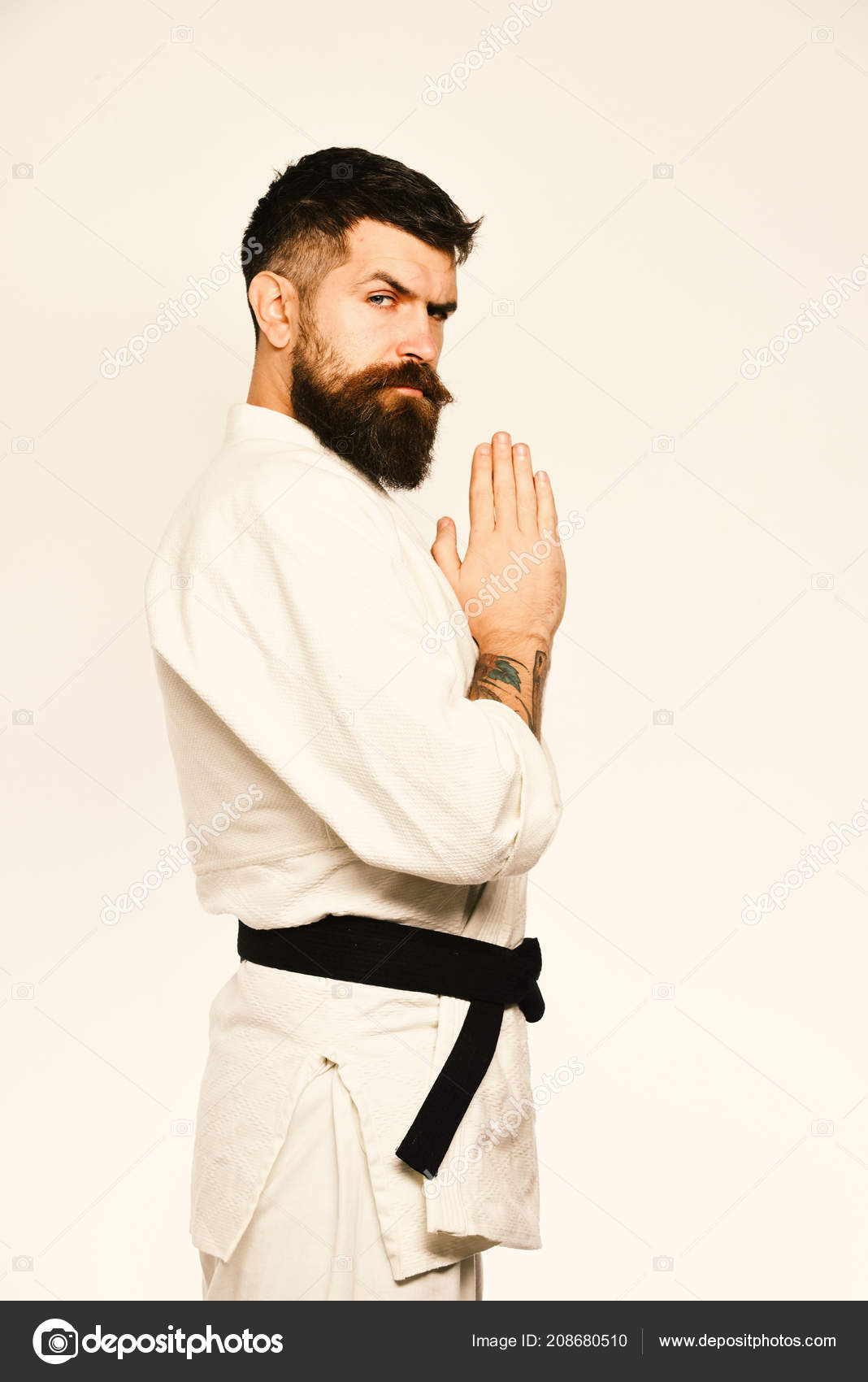 Karate Man With Strict Face In Uniform Japanese Martial Arts