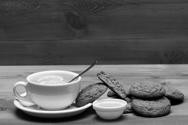 Sweet bakery and tea time. Cookies near tea