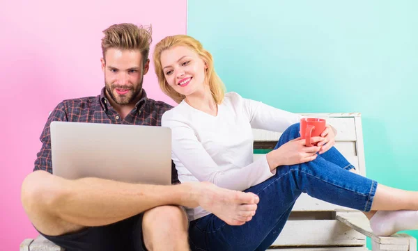 Modern young people leisure internet surfing. Spending great time together. Couple cheerful spend leisure with laptop surfing web. Couple in love relaxing surfing internet for fun. Family leisure