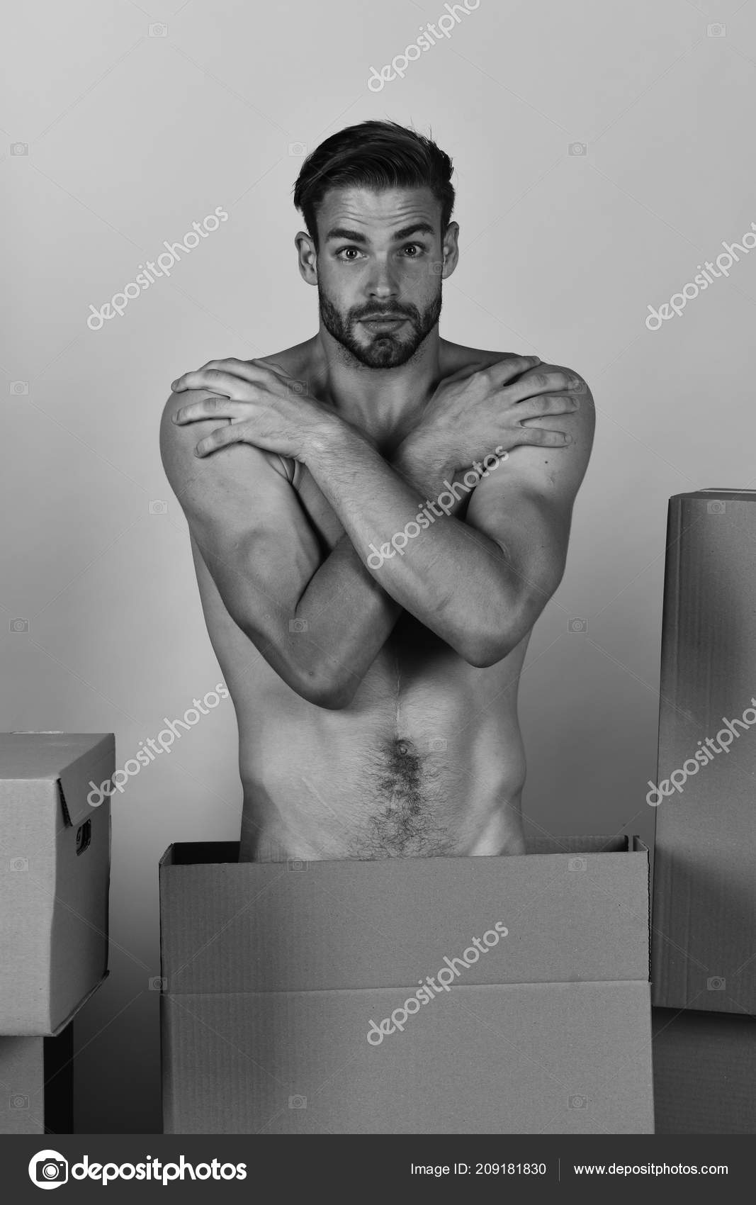 Macho with bristle and embarrassed face covering naked body — Stock Photo ©  stetsik 209181830