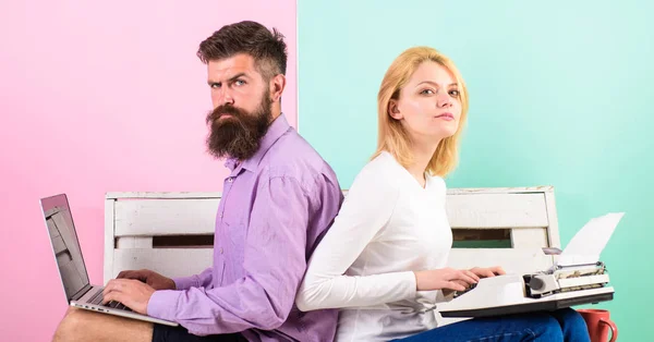 Time change old habits. Old fashioned against modern, outdated against new. Man work use modern stylish laptop and woman work retro typewriter. Can not get used new technologies. Try new technology — Stock Photo, Image