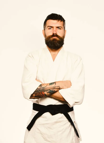 Judo master with black belt holds arms crossed. — Stock Photo, Image