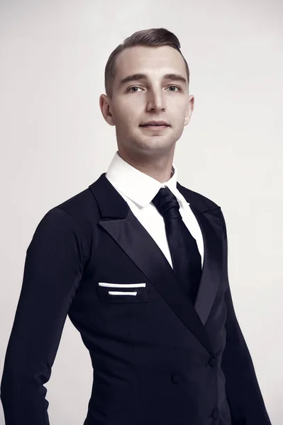 Confident attractive young man in tuxedo — Stock Photo, Image