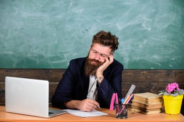 High level fatigue. Fall asleep at work. Educators more stressed work than average people. Exhausting work school cause fatigue. Life of teacher exhausting. Educator bearded man sleep table classroom clipart