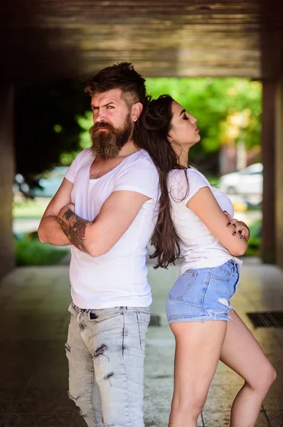 Couple problems relationship. Couple in love can not find same point of view. Girl attractive brunette bearded hipster man stand back to back porch underground crossing. Couple has disagreements