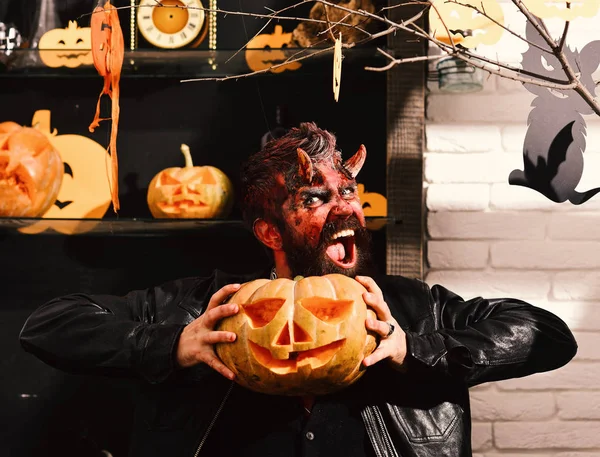 Devil or monster partying. Man wearing scary makeup for Halloween — Stock Photo, Image