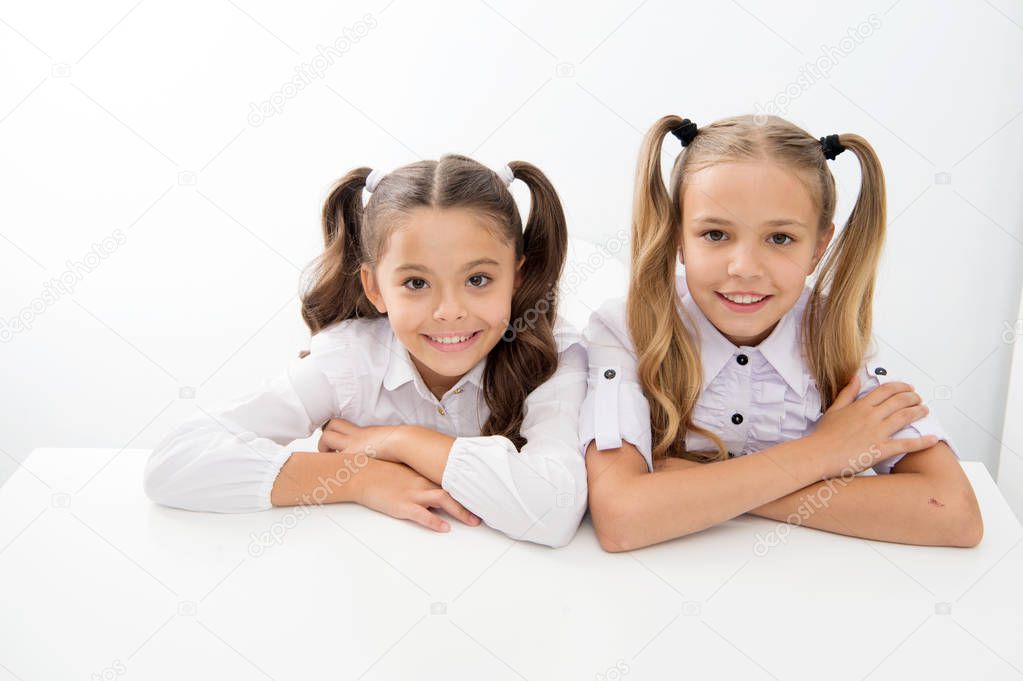 e learning. happy childhood od cute little girls. e learning for little girls isolated on white.