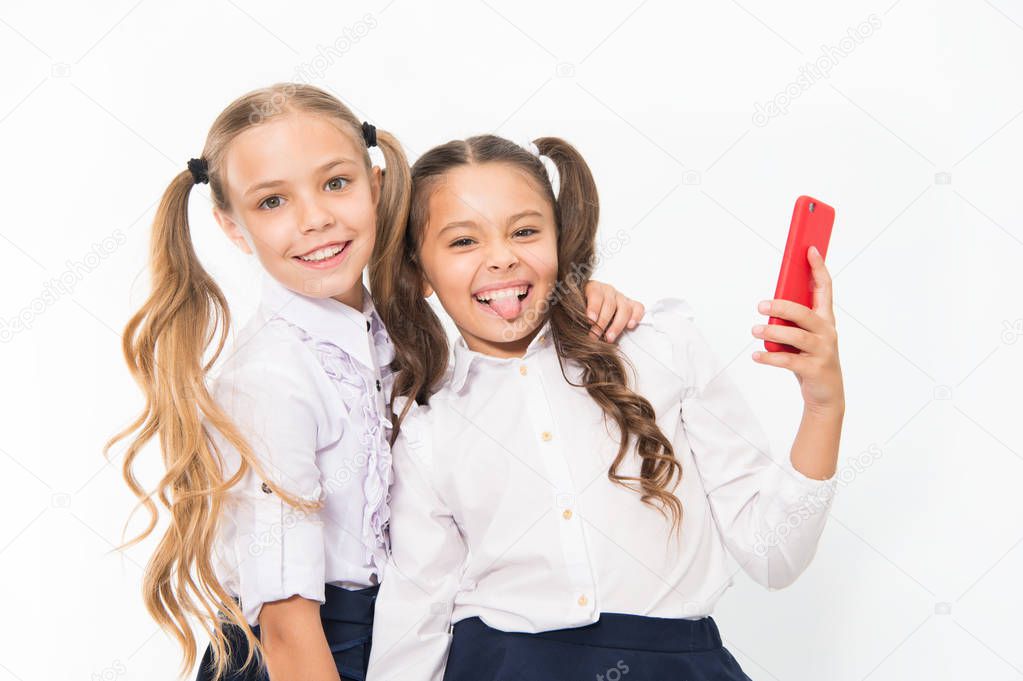Happy girls smile with 4g mobile phones. Using 4g of wireless mobile telecommunications technology