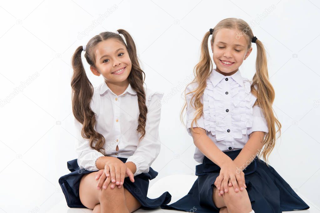 little girls smile in school uniform. little girls back to school