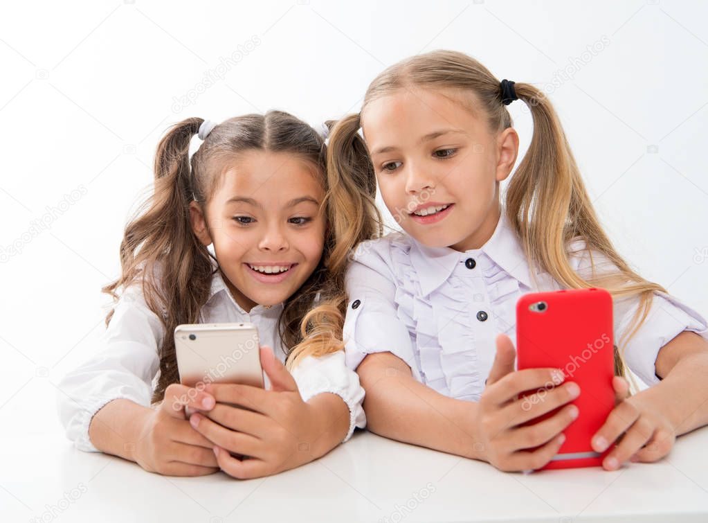 online education for digital children with happy faces. online education. happy childgren with digital devices - smartphones. we are living in digital age