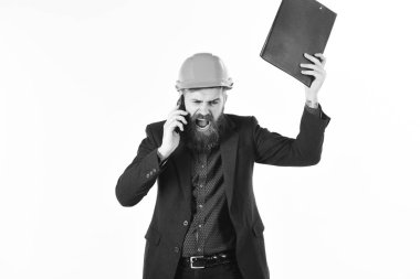 Mühendislik ve geliştirme kavramı. Mimar ya da kızgın bağırır ve cep telefonu tutar. İnşaat Mühendisliği