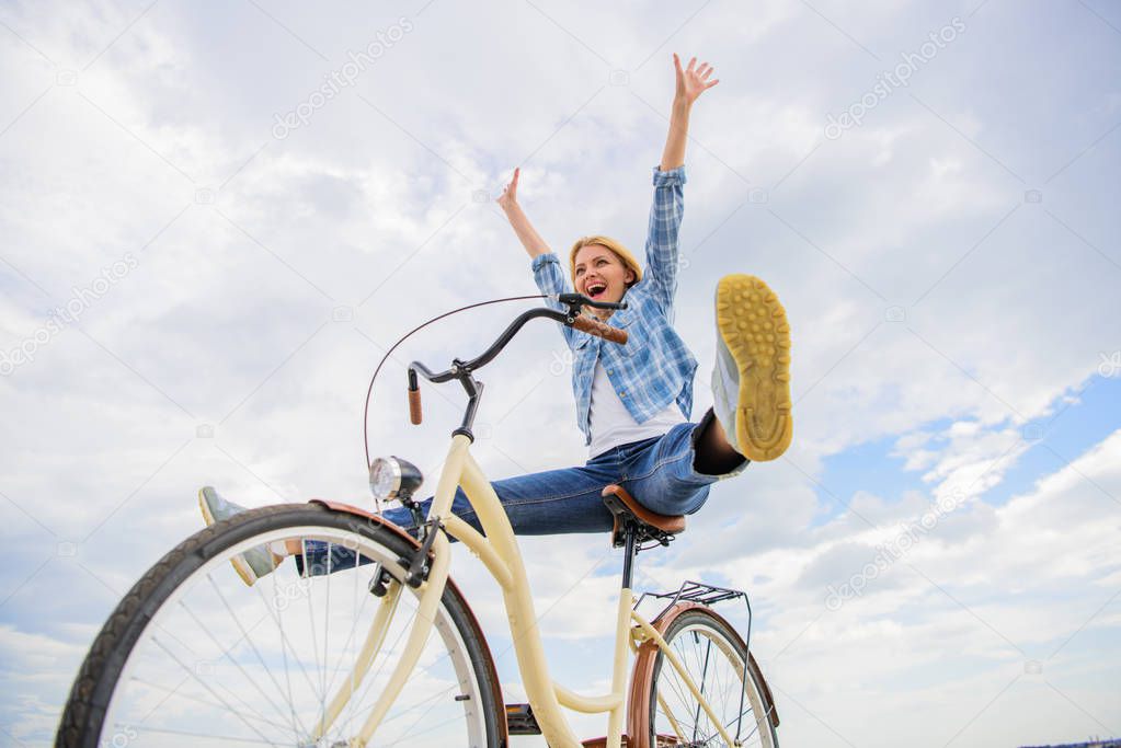Cycling gives you feeling of freedom and independence. Girl rides bicycle sky background. Freedom and delight. Woman feels free while enjoy cycling. Most satisfying form of self transportation