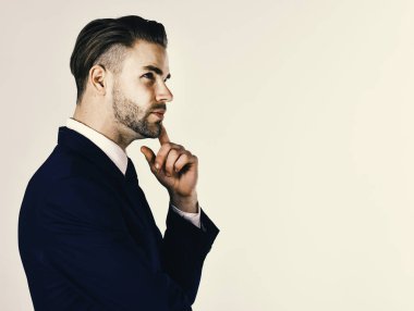 Takım elbise ya da işadamı Grey düşünceli yüzü olan adam
